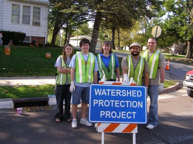 Volunteers assist with program